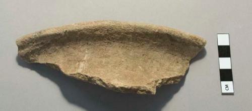 Rim sherd with band of red pigment
