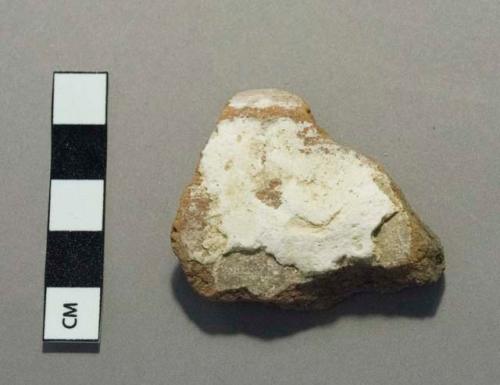 Body sherd with plaster
