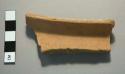 Rim sherd, brown ware