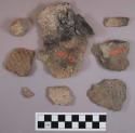 215 sherds; 2 shells; bone