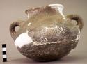 2-handled plain incised ware pottery jar - restored