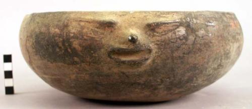 Bowl with human faces