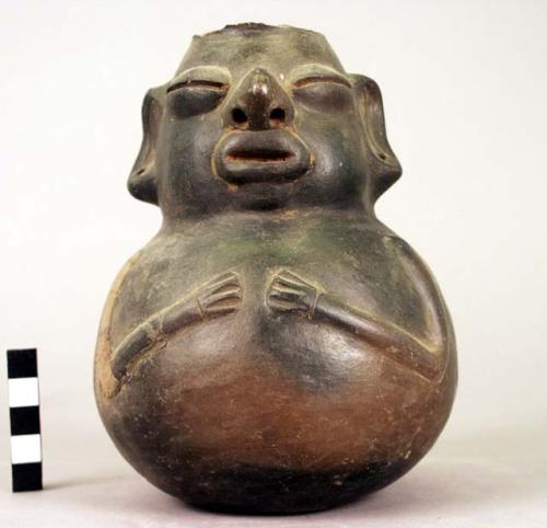 Pottery effigy vessel - height 16 1/2 cm.