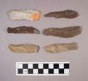 Flint blades, including brown, cream, tan, grey and reddish brown colored stone, some contains cortex