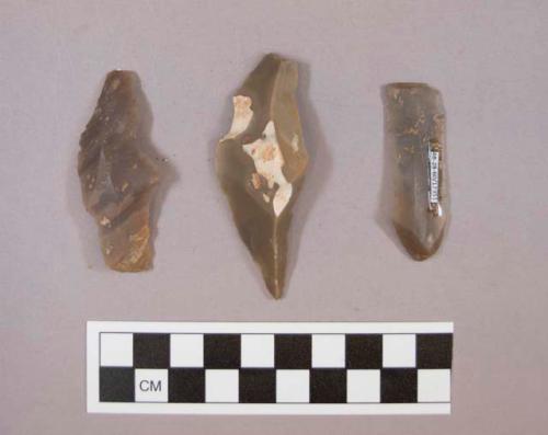 Flint flakes, including tan and purplish brown colored stone