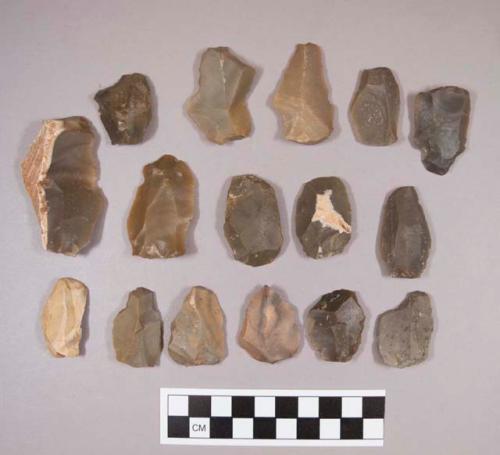 Flint flakes, including tan, brown, cream, grey and red colored stone, some contain cortex