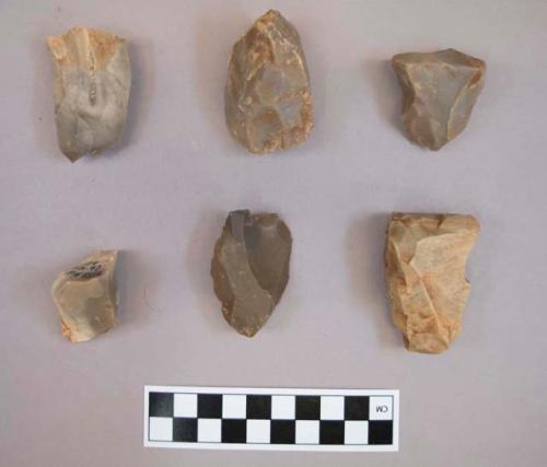 Flint cores, including tan, grey, brown and cream colored stone, some contain cortex