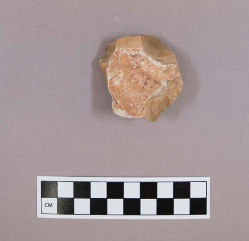 Flint core, tan colored stone, contains cortex