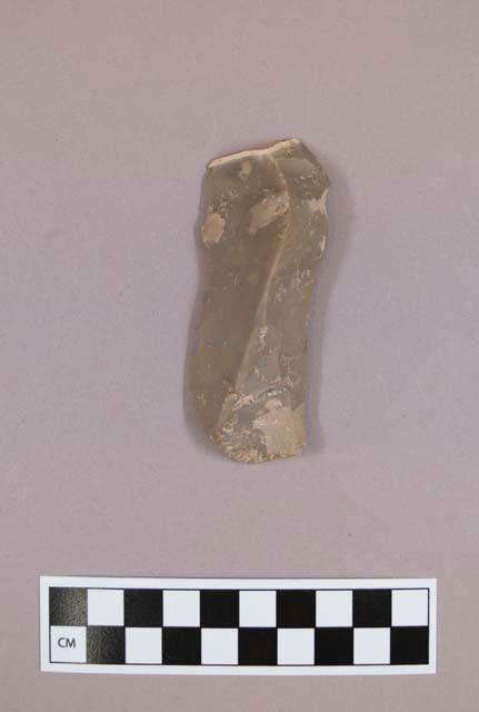 Flint flake, grey colored stone, contains cortex