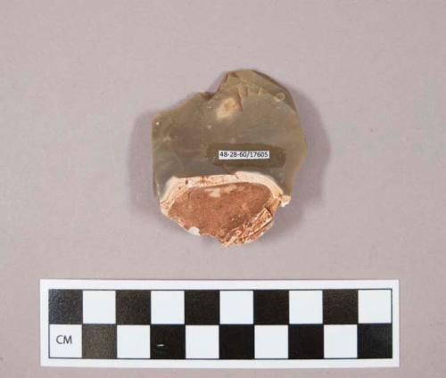 Flint flake, brown and grey colored stone, contains cortex