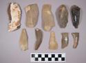 Flint flakes and blades, including tan, grey, cream and brown colored stone, some contain cortex