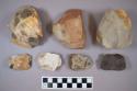 Flint cores, including tan, grey, brown and cream colored stone, some contain cortex