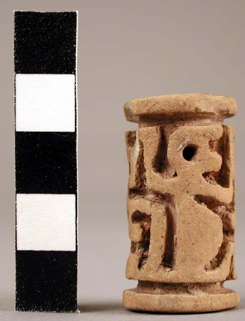 Ceramic cylinder seal, impressed animal design