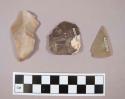 Flint flakes, including brown and tan colored stone, one includes cortex