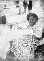 Mm. Simões sitting at a table in the expedition camp