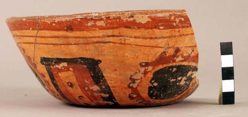 Partially restored polychrome pottery bowl