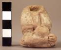 Archaic pottery figurine- seated torso