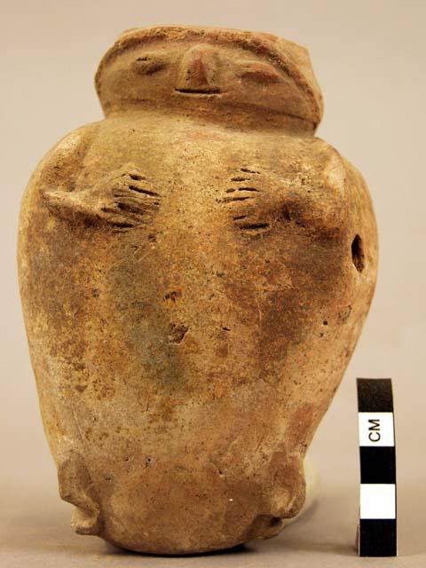 Terra cotta vase, grotesque human form