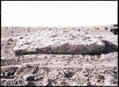 Rectangular elevated area which has been exposed by digging around it; called "citadel" in 36-38