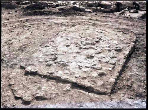 Rectangular elevated area which has been exposed by digging around it; called "citadel" in 36-38