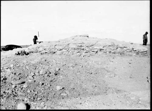 Rectangular elevated area which has been exposed by digging around it; called "citadel" in 36-38