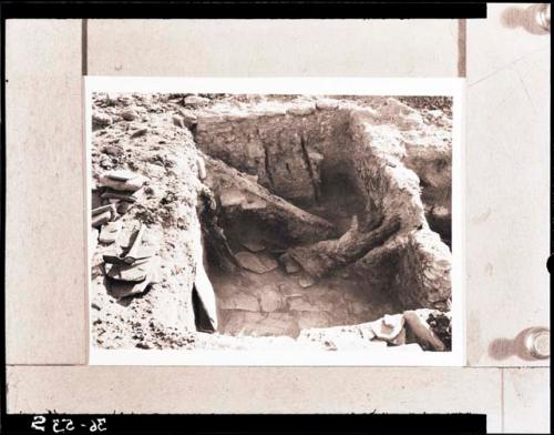 Excavated room, fallen wood, beams?