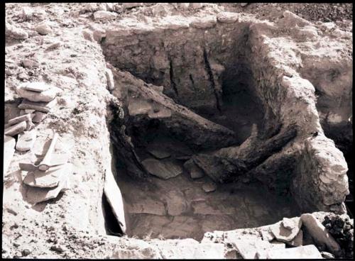 Excavated room, fallen wood, beams?