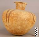 Large polychrome pottery jar (rime of neck broken)