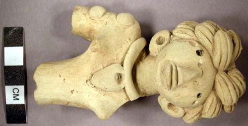 Figurine- elaborate hair, archaic type