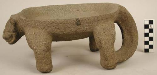 Stone tiger metate