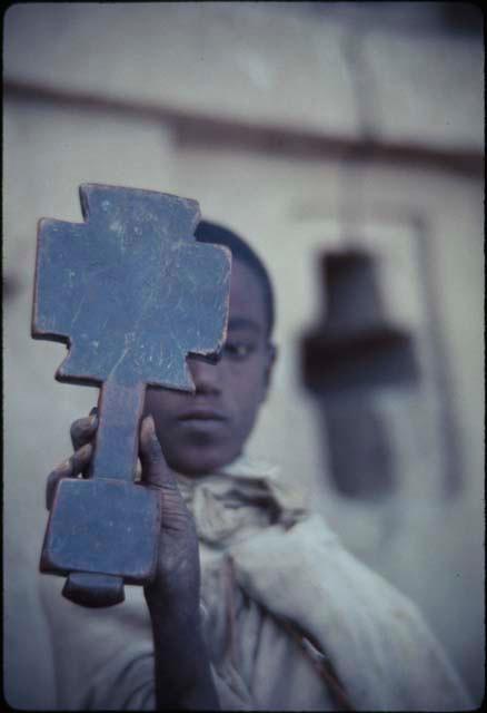 Boy holding Coptic Cross - Ethiopia