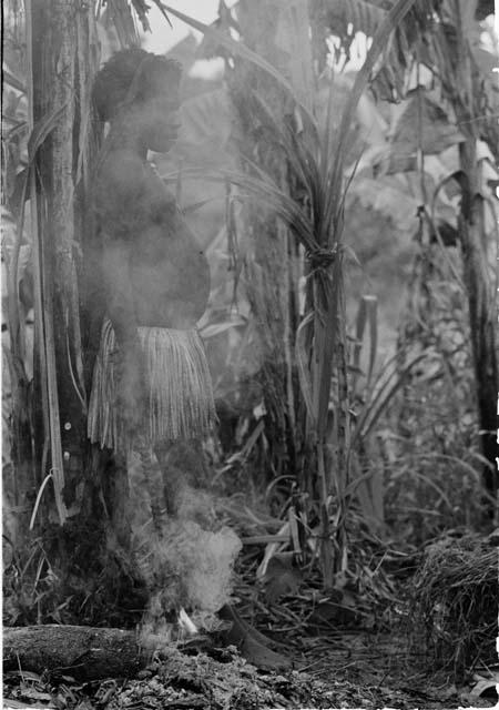 Portrait of Wekma, smoke curling in front of her