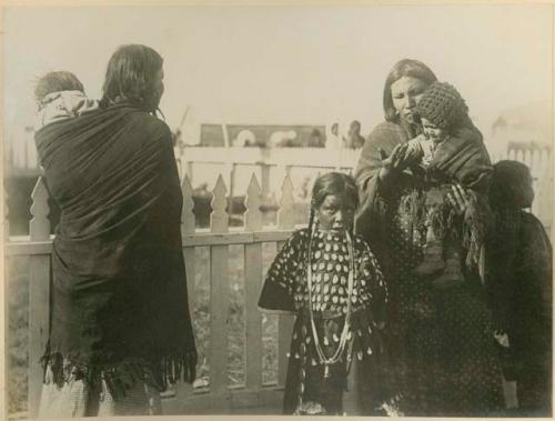 Chief's wife and daughter with another woman and children
