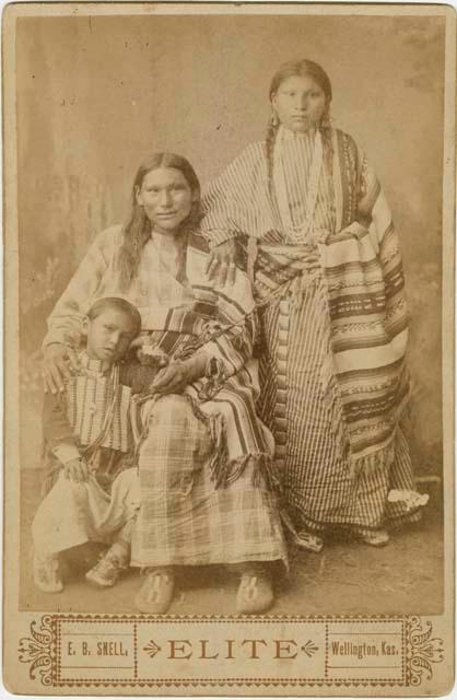 Studio portrait of man, woman and child