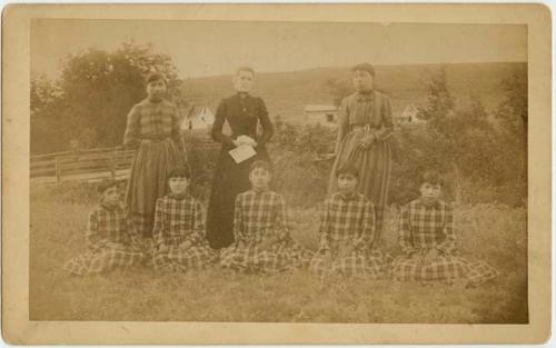 Miss Blanchard and students at a Crow Creek school