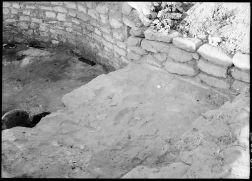 D-shaped kiva again.  Southern recess and part of main section.  Note "ceremonial feuding sticks."