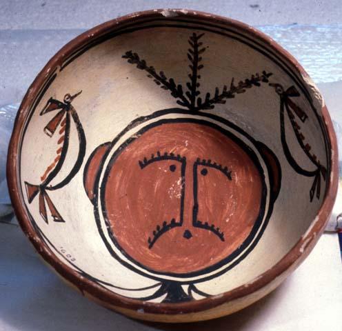 Bowl, polacca polychrome style c. int: clown design; ext: slipped, no design. 8.