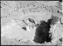 Site 4A, rooms 4-13, looking northeast.  Note stone set upright in floor of room 4.  "Step"?