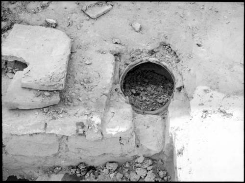 Test 14, room 6, kiva, jar in niche in SW corner.