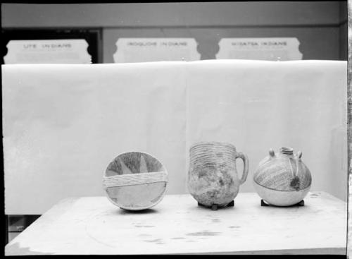 Three pottery vessels.