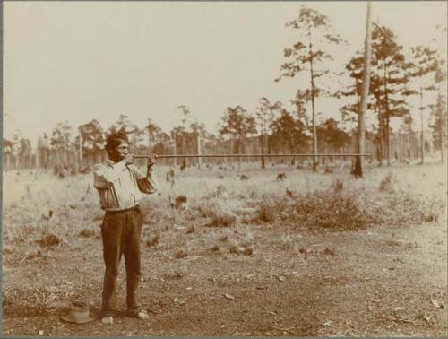 Blowgun in Position for Shooting. Joe. TOSH-KA CHIT-TOE (little of the big), with Blow Gun at Bayou Lacombe, Louisiana