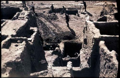 Western Mound, several rooms, people working