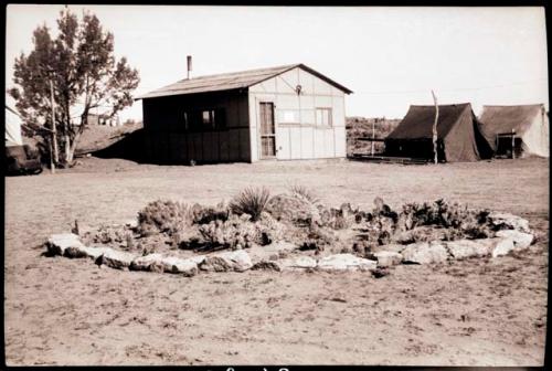 View of cactus garden, cookshack, two tents