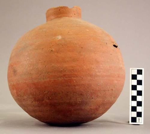 Spherical jar of red brown ware