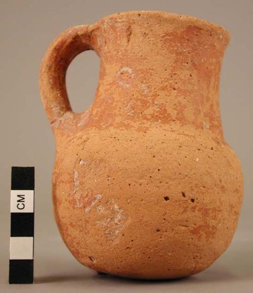 Red slipped burnished pottery jug