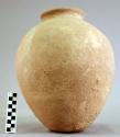 Ovoid, short-necked - flat-based pottery jar; no handle;