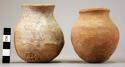 Pottery small round bellied jars, unpol. red brown