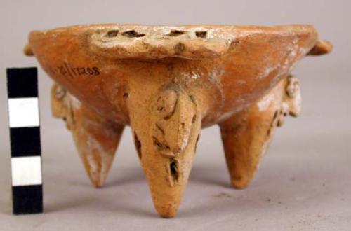 White line ware tripod bowl - 3 miniature handles; feet represent animal-like fi