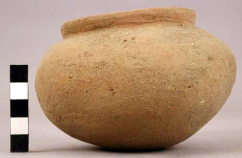 Small plain pottery vessel slightly square-shaped