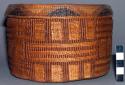 Tlingit (Yakutat) lid for trinket basket. False embroidery on exterior.